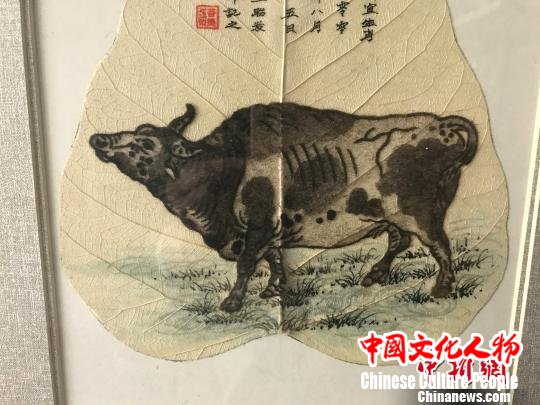 王成孝制作的胎毛画作品。 杨静 摄 王成孝制作的胎毛画作品。 杨静 摄
