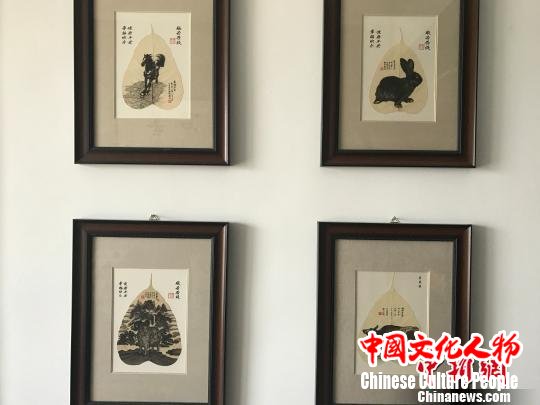 王成孝制作的胎毛画作品。 杨静 摄 王成孝制作的胎毛画作品。 杨静 摄